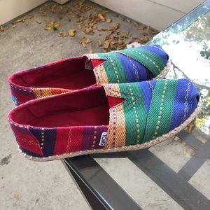 TOMS shoes slip on. Never worn.